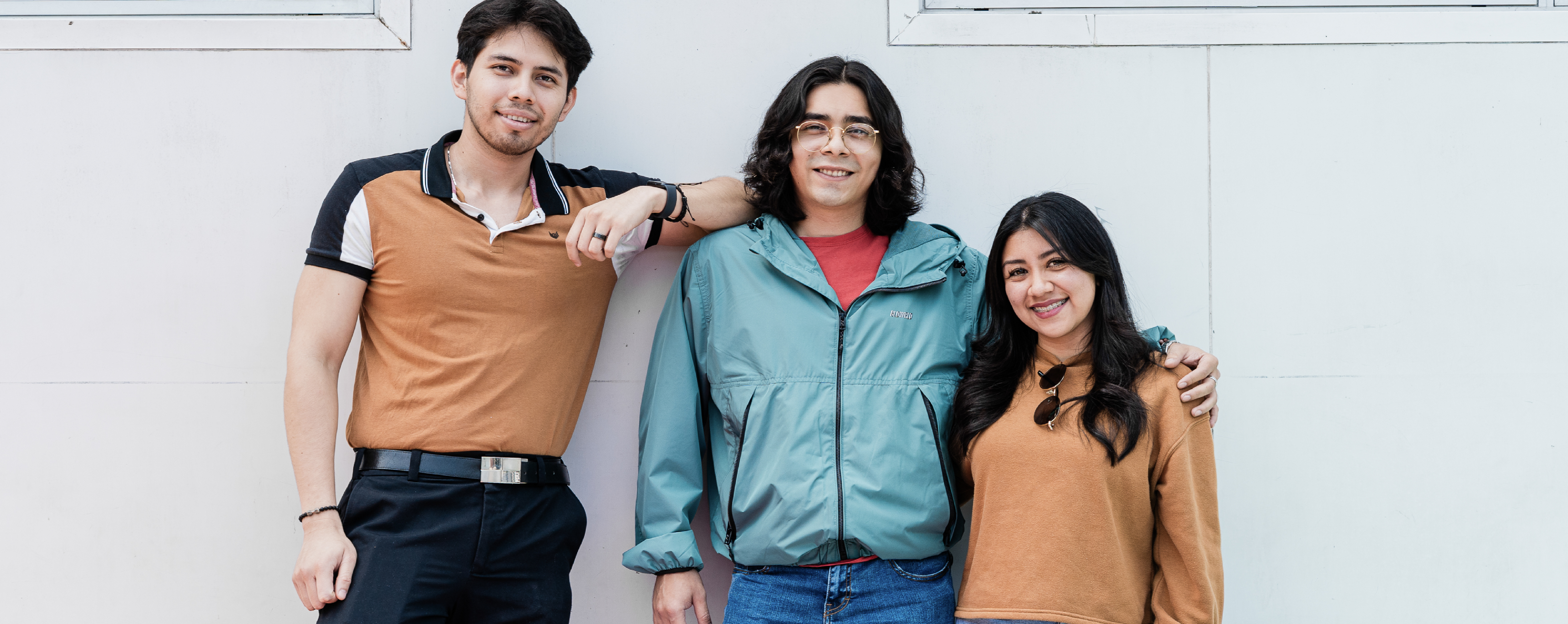 3 coworkers posing for a picture.
